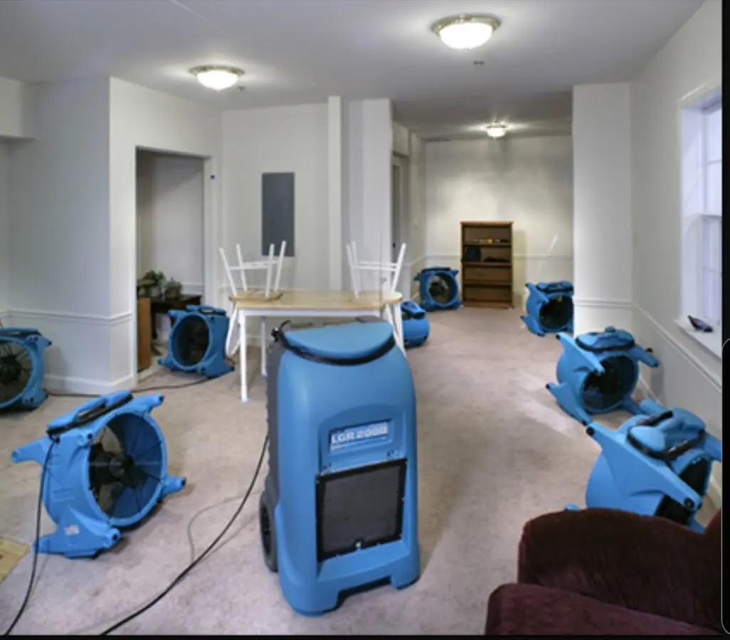 Air movers and dehumidifier setup for Water Damage Restoration in Ambridge